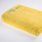 Хлопковое махровое полотенце Re:volution желтое 50х90 см
